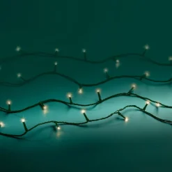 96 warm white LED lights, green wire, int./ext., battery-operated, 23′