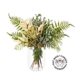 Artificial greenery and fern floral arrangement in vase