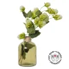 Artificial hop flowers in a glass vase