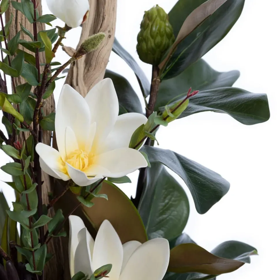 Artificial magnolia and driftwood floor arrangement