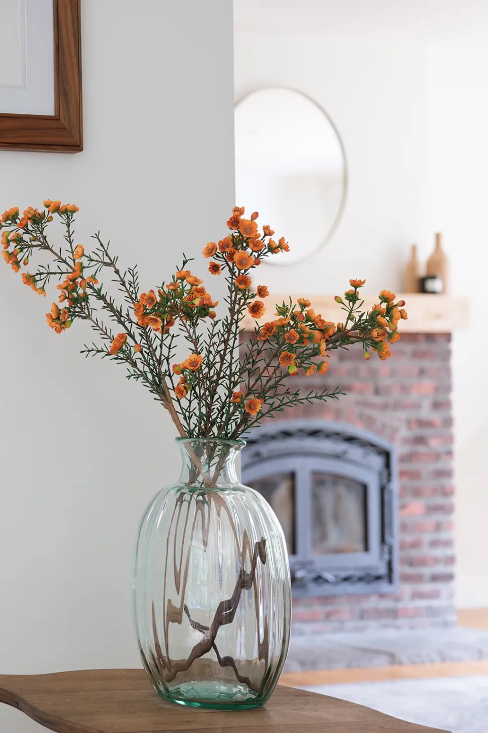 Artificial orange wax flower, 31″