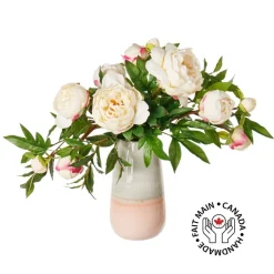 Artificial peony flower bouquet in pink vase