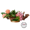 Artificial pink flower and greenery centerpiece