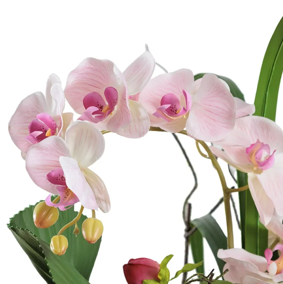 Artificial pink tropical flowers in a vase