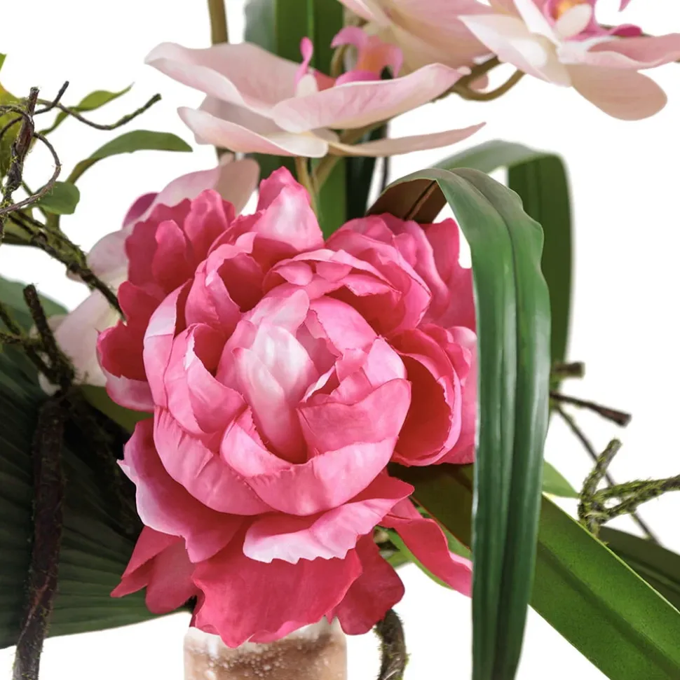 Artificial pink tropical flowers in a vase