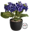 Artificial purple spring flower bouquet in a black pot