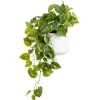 Artificial small pothos plant in a white pot