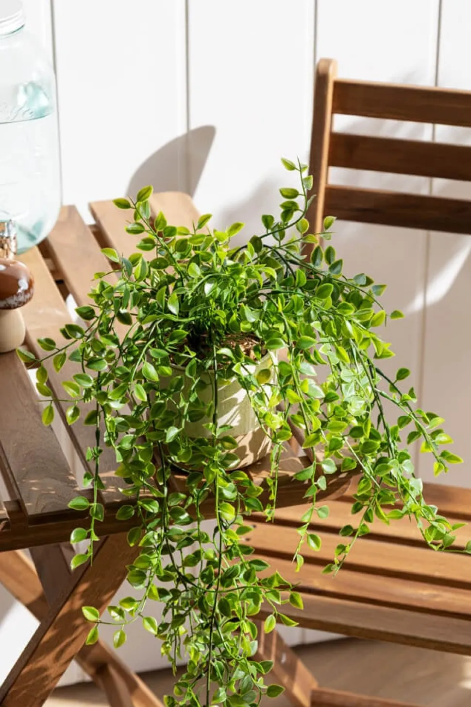 Artificial trailing plant in a handmade planter, 25 x 11"