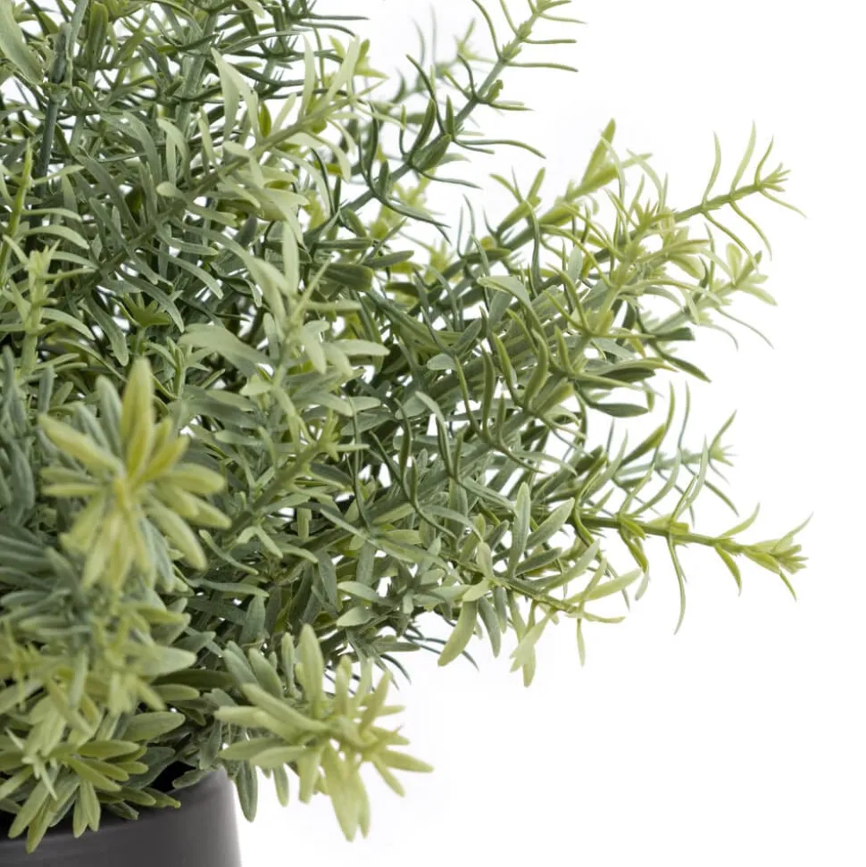 Artificial verdigris grasses in a black pot