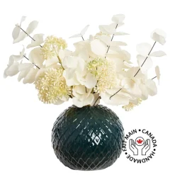 Artificial white eucalyptus in a round vase