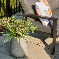 Artificial white flower arrangement in a grey terrazzo beige pot, 28