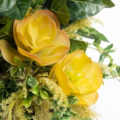 Artificial yellow succulent arrangement in standing planter