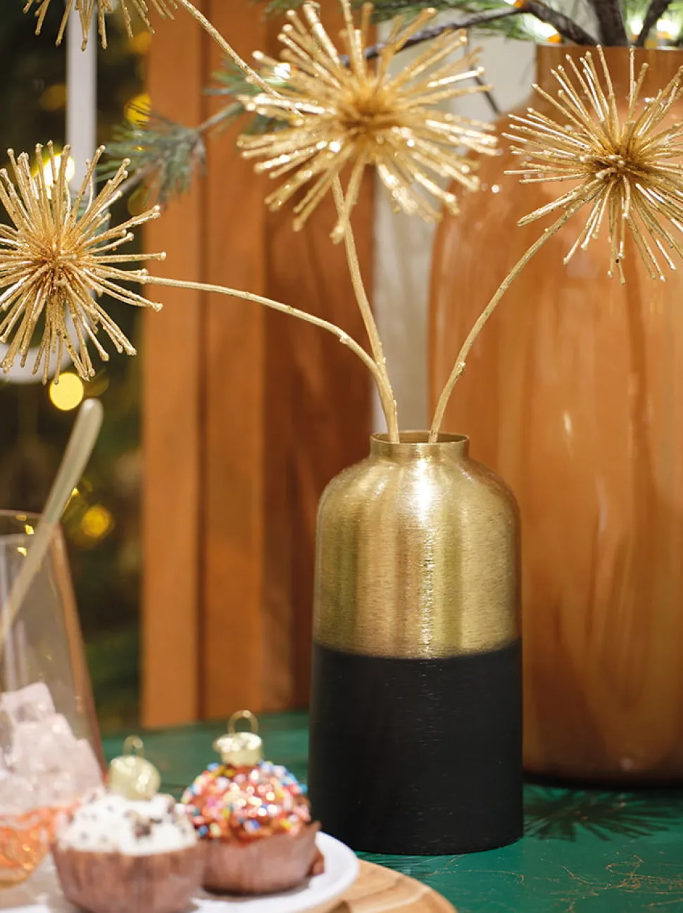 Black and gold iron vase