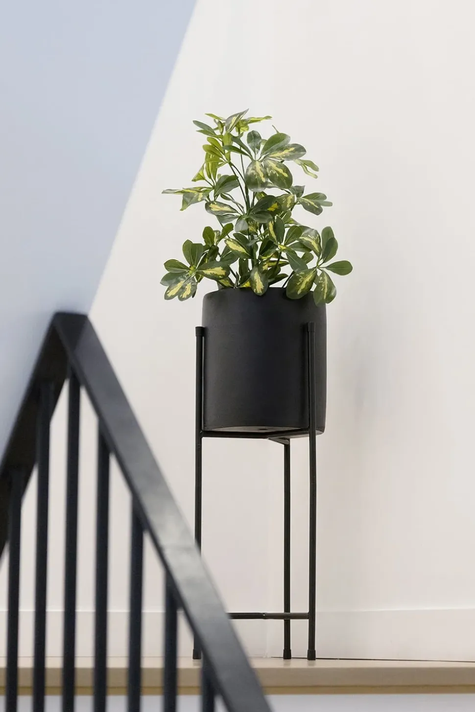 Black metal plant stand
