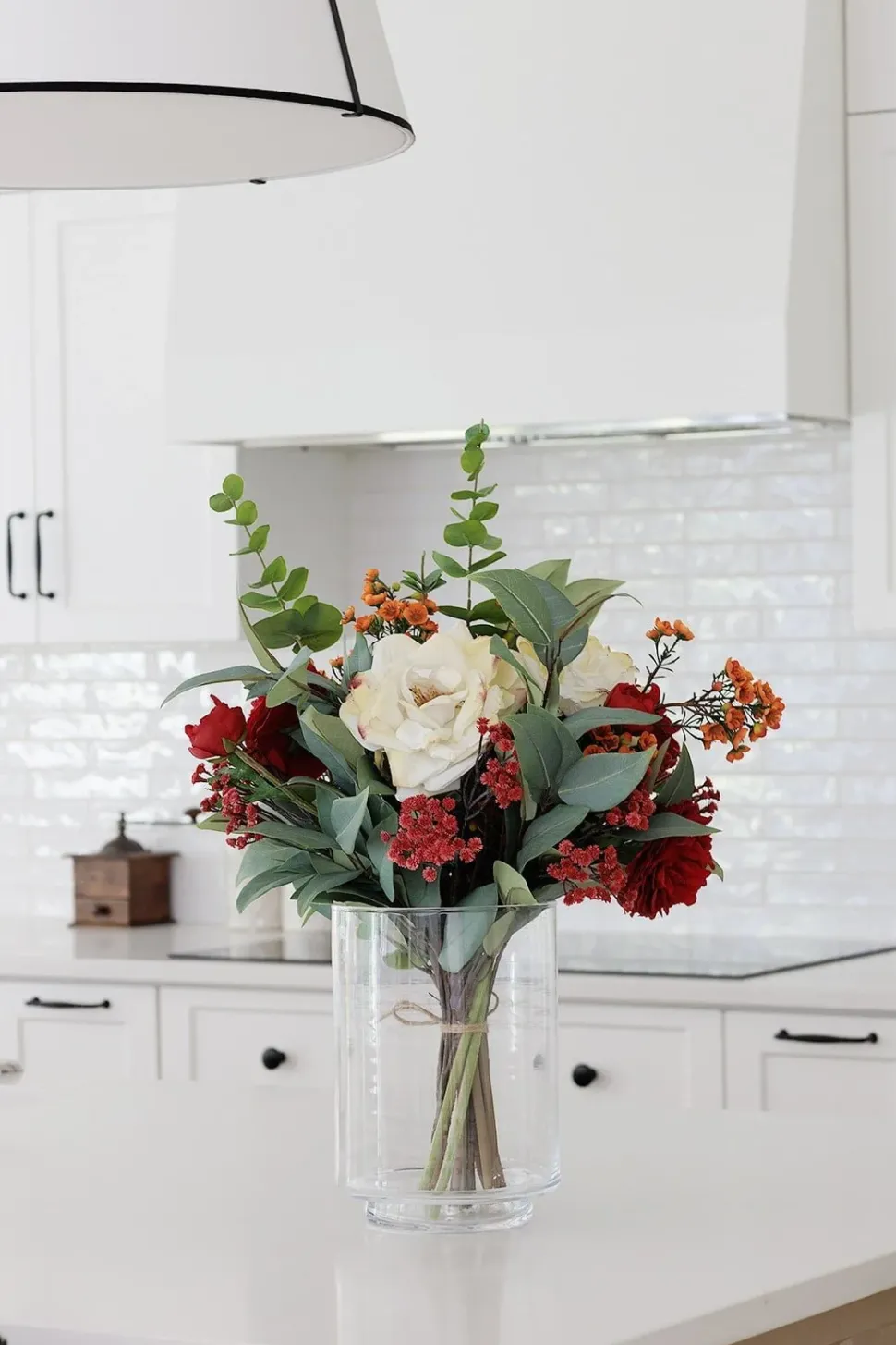 Bouquet automnal rouge et orange en vase