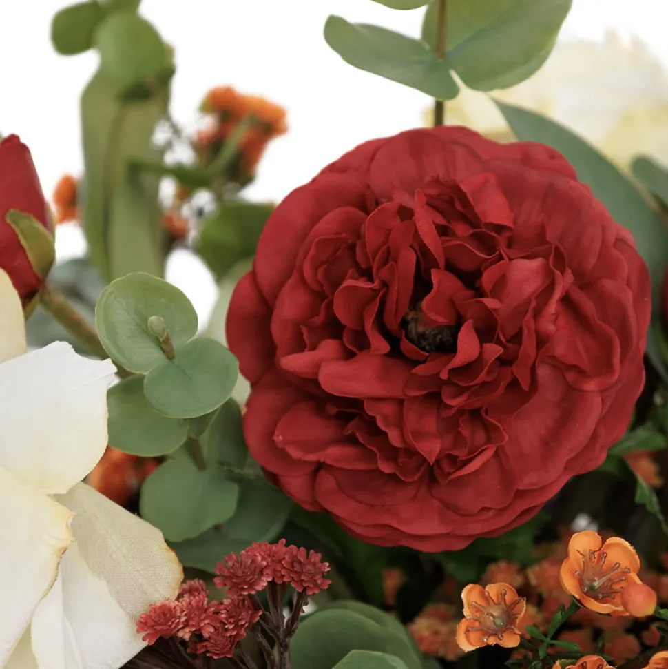 Bouquet automnal rouge et orange en vase