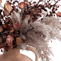 Burgundy and cream flower arrangement