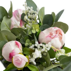 Centre de table de pivoines roses et eucalyptus