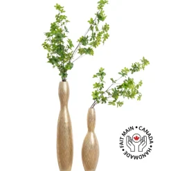Duo of tall floor vases with artificial greenery