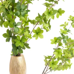 Duo of tall floor vases with artificial greenery