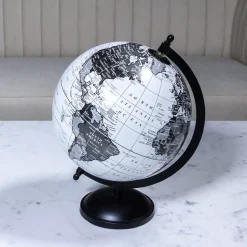Grey and white earth globe on a black stand, 8"