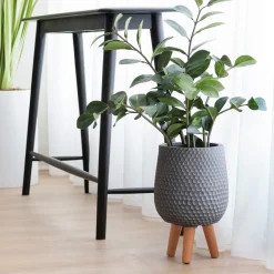 Grey textured wooden plant stand