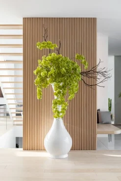 Large white glossy fiberglass vase