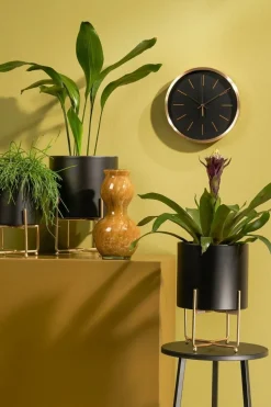 Modern black wall clock, 10 x 10″