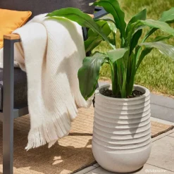 Outdoor artificial curcuma in a grey terrazzo beige pot, 30 x 16"