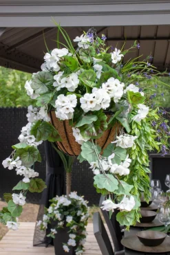 Outdoor hanging flower pot with white geranium, 27 x 20″