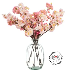Pink cherry blossom bouquet in a vase