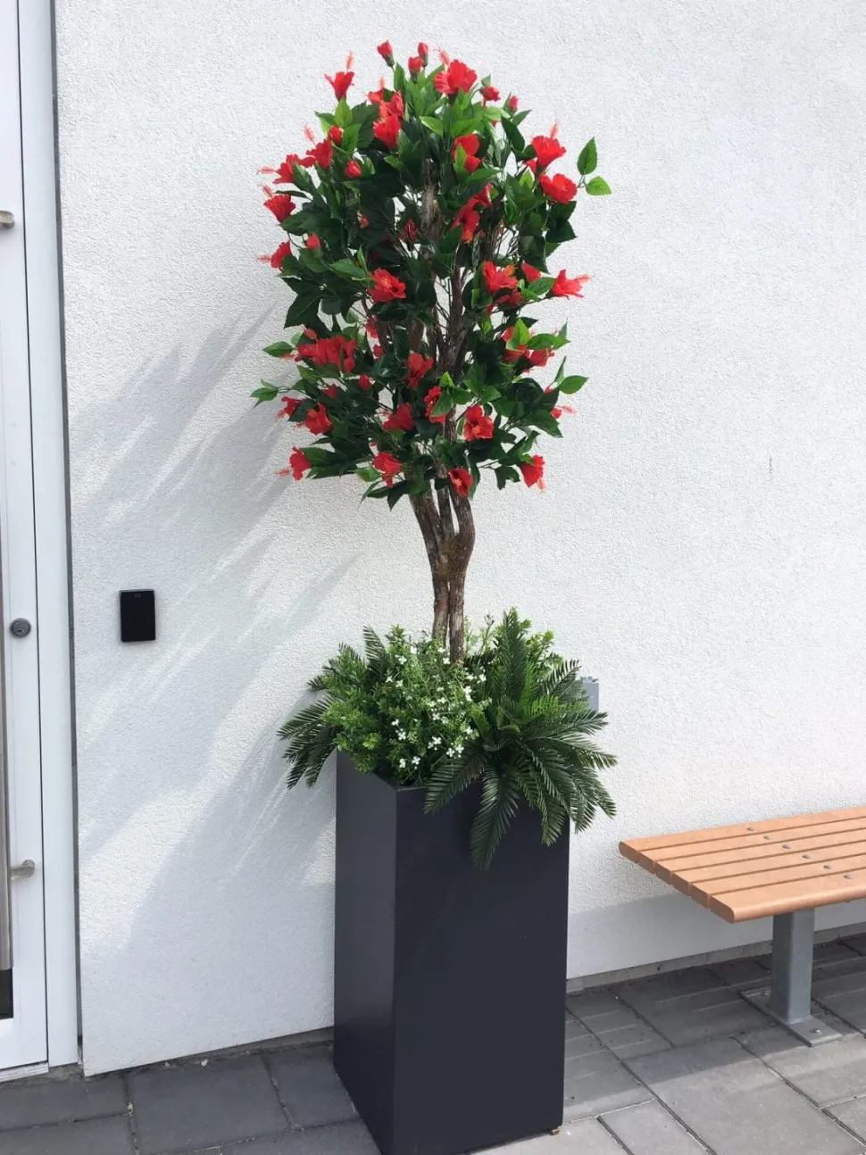 Red artificial outdoor hibiscus tree