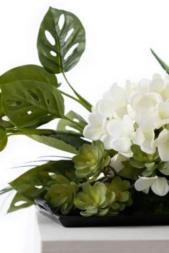 Renonculus and foliage table centerpiece