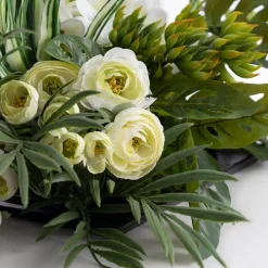 Renonculus and foliage table centerpiece