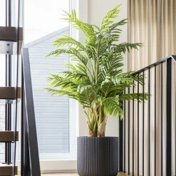 Rounded ribbed black fiber cement pot