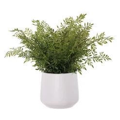 Small green fern artificial plant in a white pot