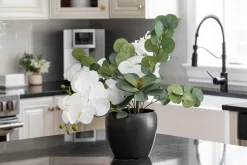 White flower arrangement with succulents