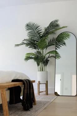 Wooden plant stand with white pot