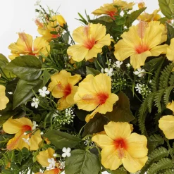 Yellow artificial flowers for grave